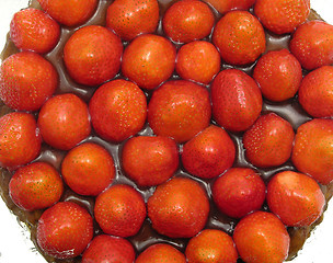 Image showing Close-up view of a strawberry cake on white background