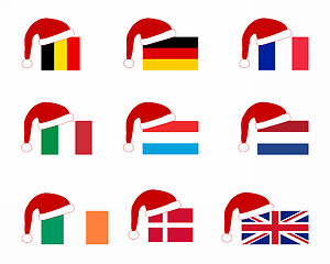 Image showing Flag of nine countries with Santa Claus cap