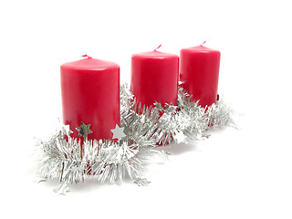 Image showing Red candles with christmas decoration