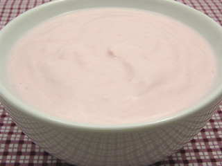 Image showing Curd cheese in a bowl of chinaware on checked  tablecloth 