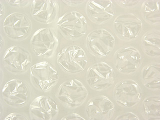 Image showing Background with bursted bubbles of a plastic package foil