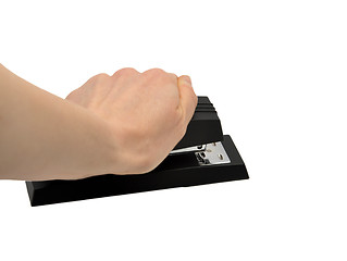 Image showing Hand on stapler 