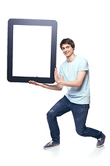 Image showing Full length man carrying tablet frame