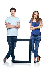 Image showing Full length couple with tablet frame