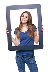 Image showing Woman holding tablet frame