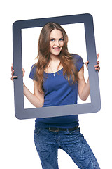 Image showing Woman holding tablet frame