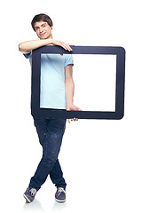 Image showing Full length man holding tablet frame