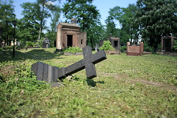 Image showing felled grave cross