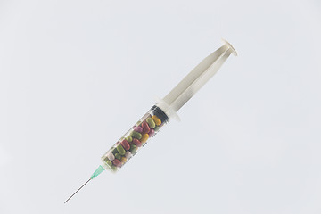 Image showing syringe and pills