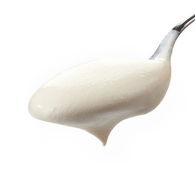 Image showing Spoon with cream