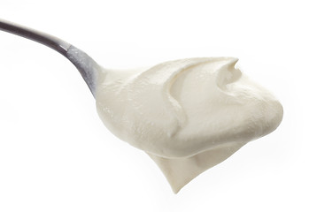 Image showing Spoon with cream