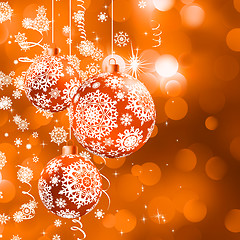 Image showing Christmas balls over orange bokeh. EPS 8