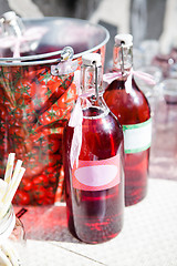 Image showing Bottles of fruit juice