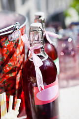 Image showing Bottles of fruit juice