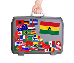 Image showing Used plastic suitcase with stickers