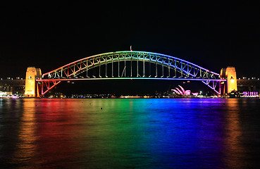 Image showing Iconic Sydney Harbour Bridge in rainbow colour during Vivid Sydn