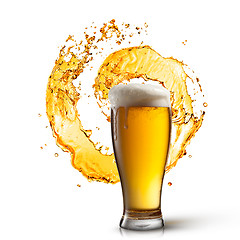 Image showing Beer in glass with splash isolated on white