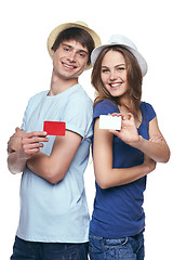 Image showing Happy couple showing credit cards