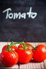 Image showing fresh tomatoes and blackboard 