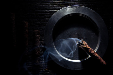 Image showing cigars in shadows