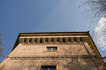 Image showing manor fragment with windows on blue sky background 