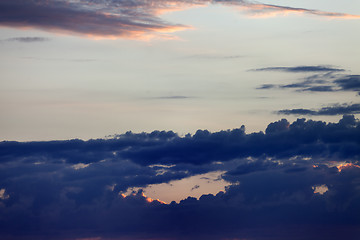 Image showing Sky with dark clouds at sunset