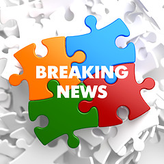 Image showing Breaking News on Multicolor Puzzle.