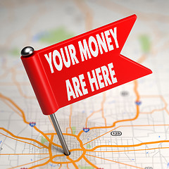 Image showing Your Money are Here - Small Flag on a Map Background.