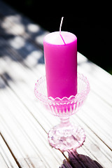 Image showing Decorative purple candle