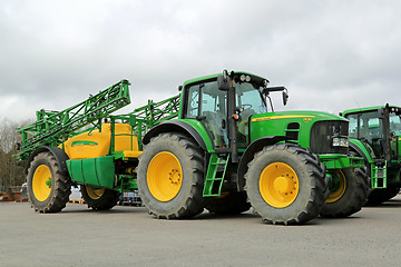 Image showing John Deere 7530 Agricultural Tractor and 732i Trailed Sprayer