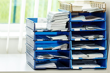 Image showing file folders on the shelves at office