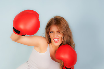 Image showing Beautiful woman wearing boxing gloves