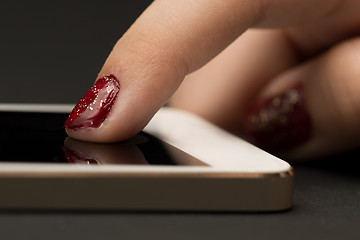 Image showing Girl hand with smartphone