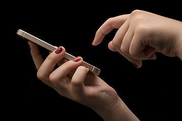 Image showing Girl hand with smartphone