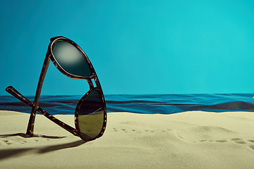 Image showing sunglasses on the beach