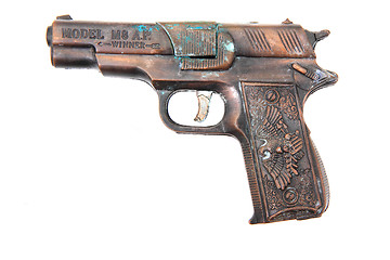 Image showing old metal gun toy 