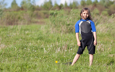 Image showing Portrait of little girl in wetsuit