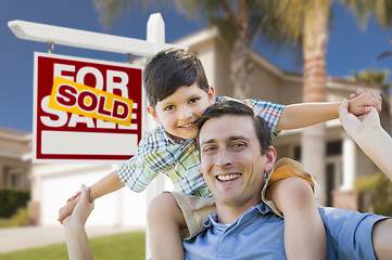 Image showing Mixed Race Father, Son Piggyback, Front of House, Sold Sign