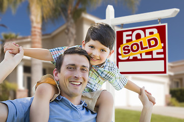 Image showing Mixed Race Father, Son Piggyback, Front of House, Sold Sign