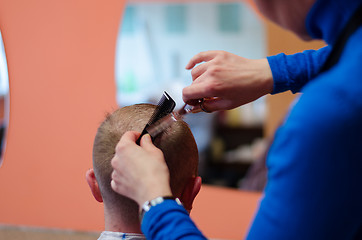 Image showing man haircut at the barber scissors  