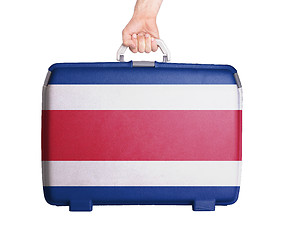 Image showing Used plastic suitcase with stains and scratches