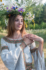 Image showing Young beautiful woman with flower wreath