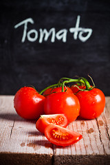 Image showing fresh tomatoes and blackboard 