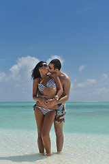 Image showing happy young couple have fun on beach