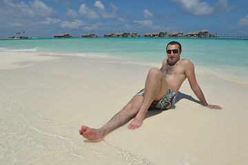 Image showing young man have fun and relax on beach