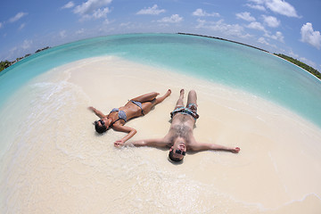 Image showing happy young couple have fun on beach