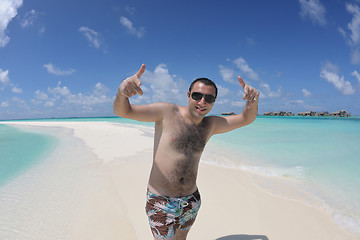 Image showing young man have fun and relax on beach