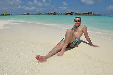 Image showing young man have fun and relax on beach