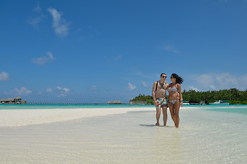 Image showing happy young couple have fun on beach