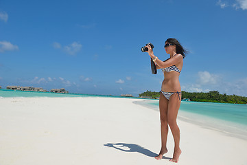 Image showing beautiful young woman  on beach have fun and relax